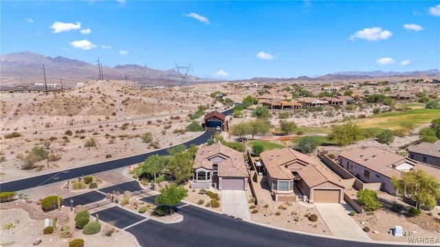 aerial view with a residential view and a mountain view