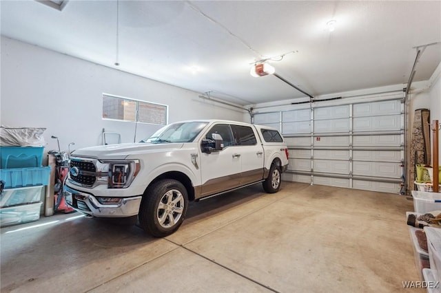 garage featuring a garage door opener