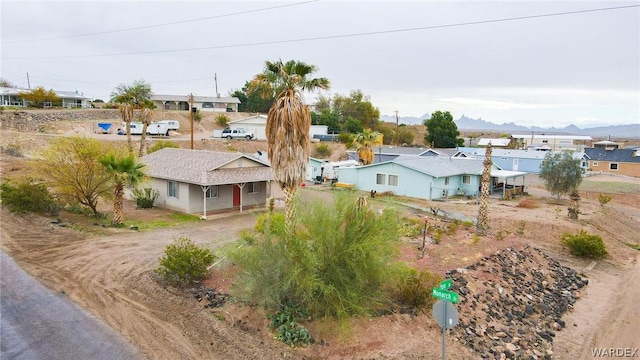 birds eye view of property featuring a residential view and a mountain view