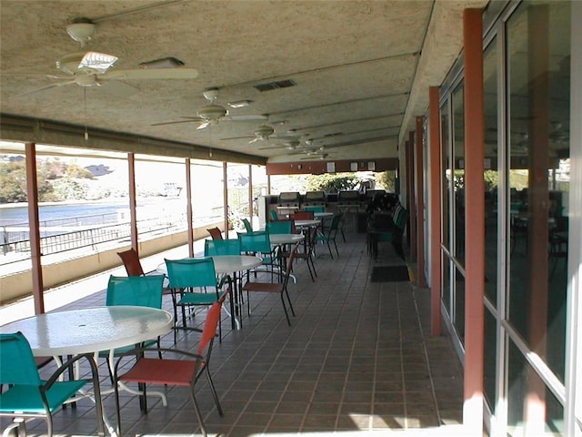 441 Moser Ave Unit B3, Bullhead City, AZ 86429 - sunroom with outdoor dining space and a ceiling fan