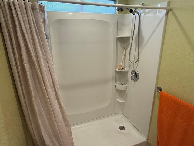 441 Moser Ave Unit B3, Bullhead City, AZ 86429 - bathroom with a stall shower and a textured wall