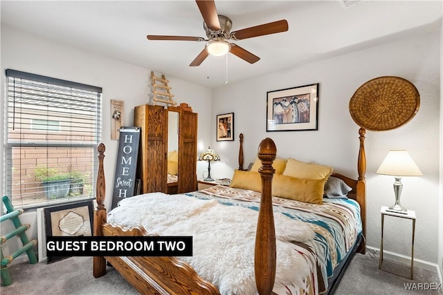 carpeted bedroom featuring a ceiling fan