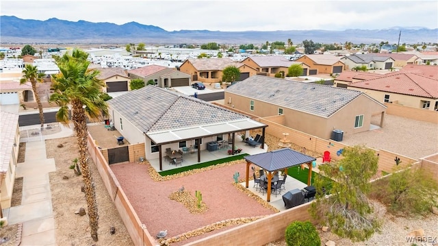 aerial view with a mountain view and a residential view