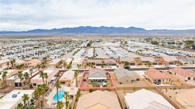 drone / aerial view with a mountain view and a residential view