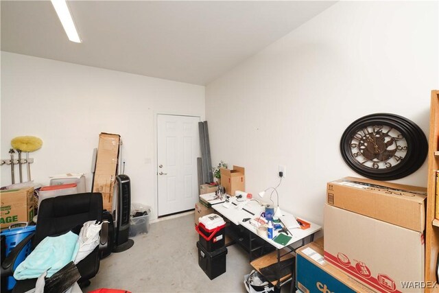 office area featuring concrete flooring