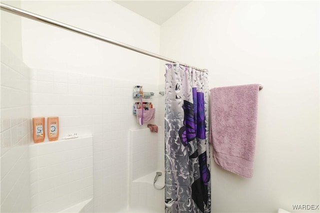 bathroom with curtained shower