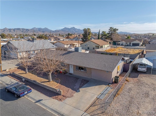 bird's eye view featuring a residential view and a mountain view