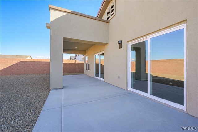 view of patio with fence