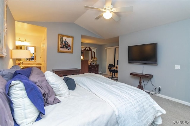 bedroom featuring carpet, lofted ceiling, a closet, ceiling fan, and baseboards