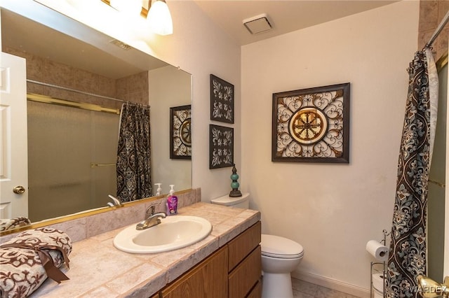 full bath with a shower with shower curtain, vanity, toilet, and tile patterned floors