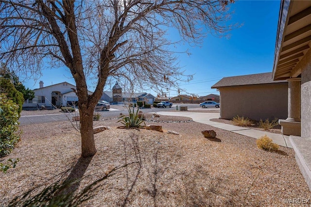 view of yard with a residential view