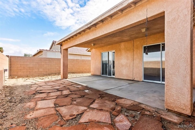 view of patio with fence