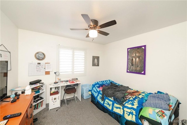 bedroom with a ceiling fan and carpet floors