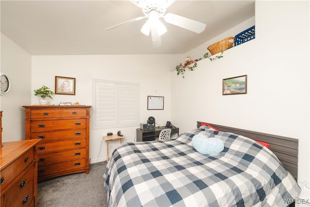 bedroom with lofted ceiling, light colored carpet, and a ceiling fan