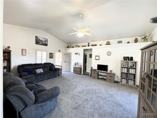 living area with lofted ceiling, carpet, visible vents, and ceiling fan