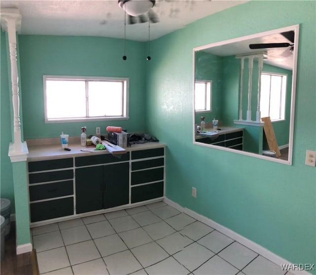 kitchen with a healthy amount of sunlight and baseboards