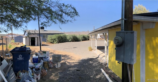 view of yard with a shed and an outdoor structure