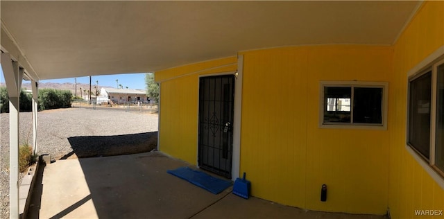 view of patio featuring fence