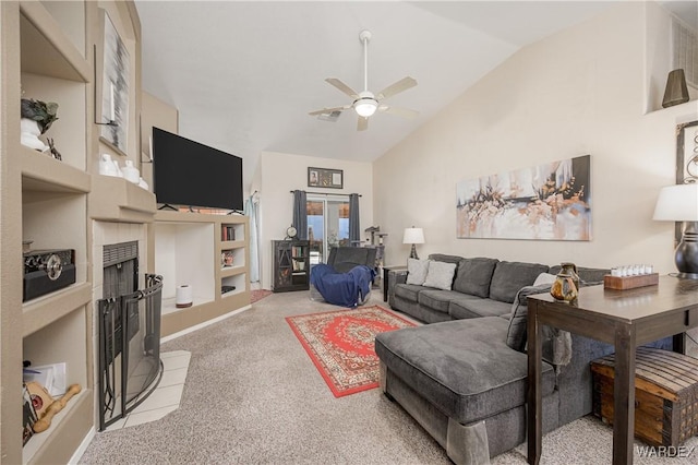 living area featuring high vaulted ceiling, light carpet, a fireplace, and ceiling fan