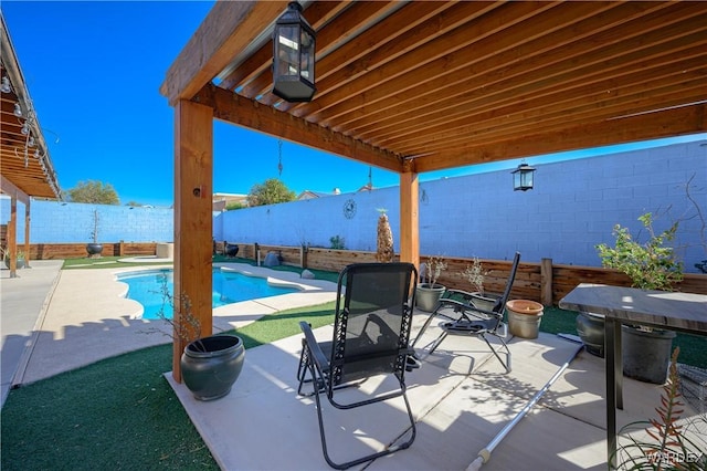 view of patio with a fenced in pool and a fenced backyard