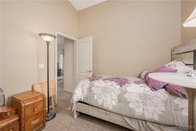 bedroom with light colored carpet