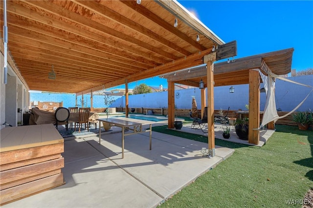 view of patio / terrace with a fenced in pool and fence private yard