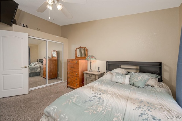 bedroom featuring carpet floors, a closet, and a ceiling fan