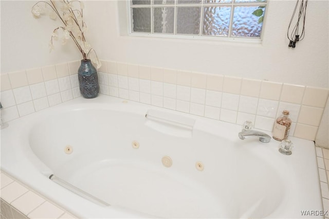 bathroom featuring a jetted tub