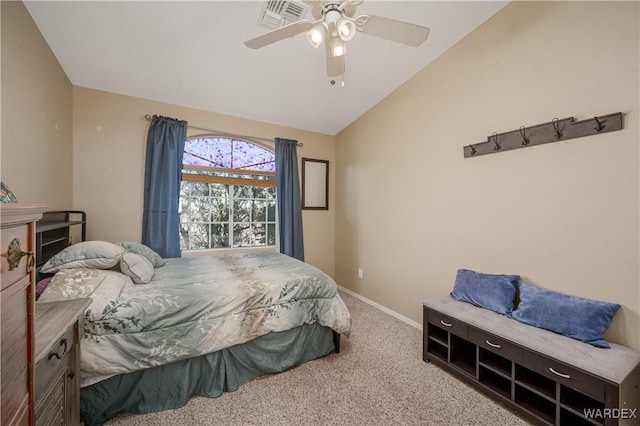 bedroom featuring ceiling fan, visible vents, baseboards, vaulted ceiling, and carpet