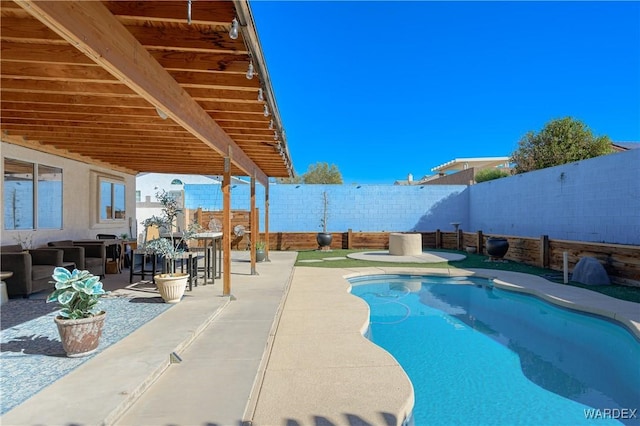 view of pool featuring a patio area, a fenced backyard, outdoor dry bar, and a fenced in pool