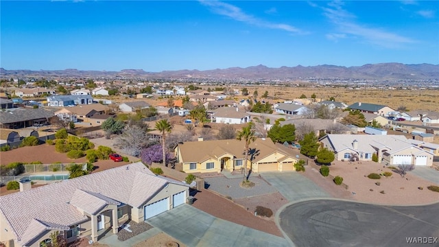 aerial view with a residential view and a mountain view