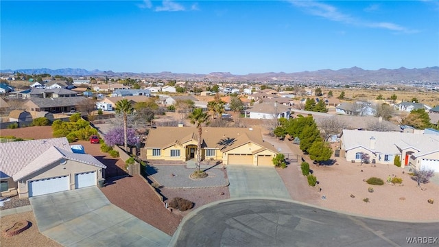 bird's eye view featuring a residential view and a mountain view