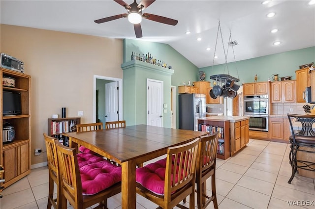 dining room featuring light tile patterned floors, visible vents, lofted ceiling, ceiling fan, and recessed lighting