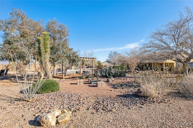 exterior space featuring a pergola