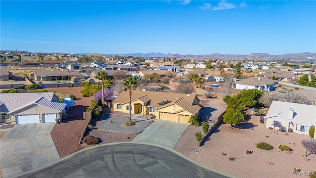 bird's eye view featuring a residential view and a mountain view