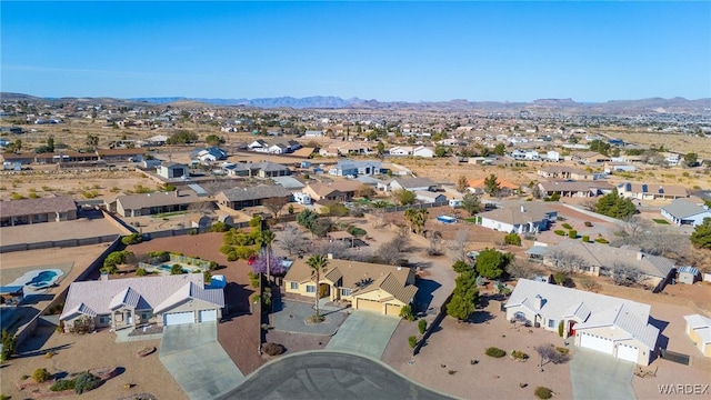 bird's eye view featuring a residential view and a mountain view