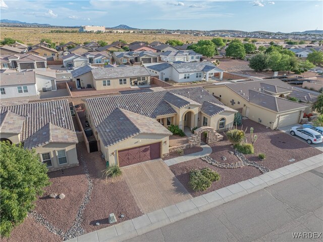 bird's eye view featuring a mountain view and a residential view