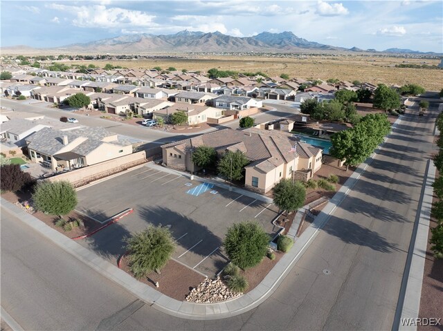 birds eye view of property with a residential view and a mountain view