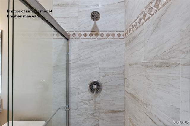full bath featuring a tile shower