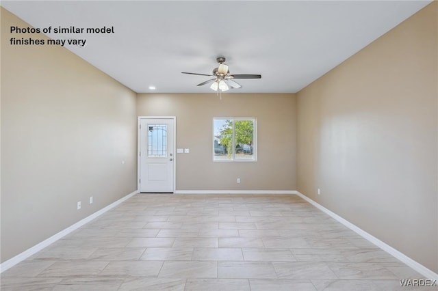 empty room featuring recessed lighting, a ceiling fan, and baseboards