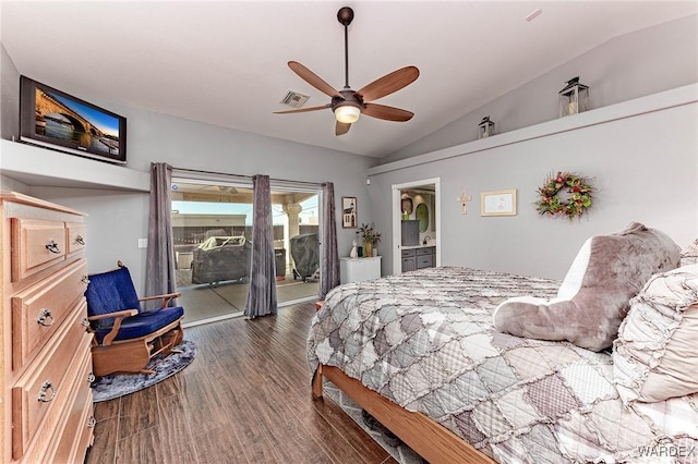 bedroom featuring visible vents, a ceiling fan, dark wood-style floors, access to exterior, and vaulted ceiling