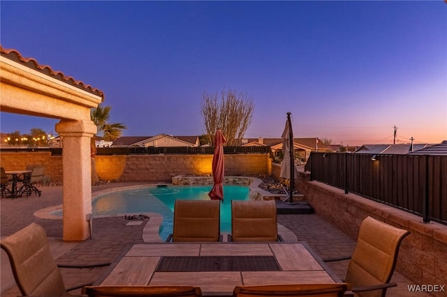 view of patio / terrace with a fenced backyard and a fenced in pool