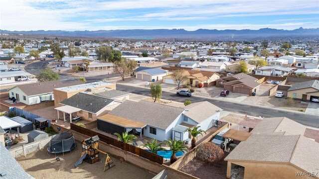 bird's eye view with a residential view and a mountain view