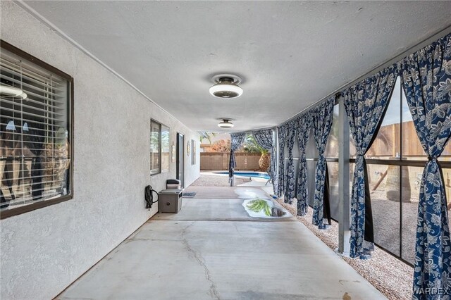 view of patio / terrace with a fenced in pool and a fenced backyard