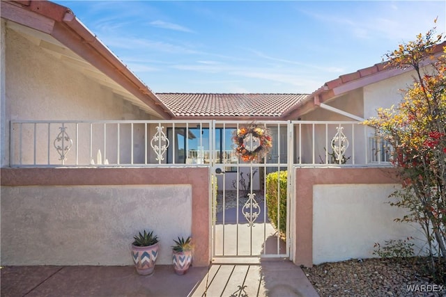 view of gate featuring a fenced front yard