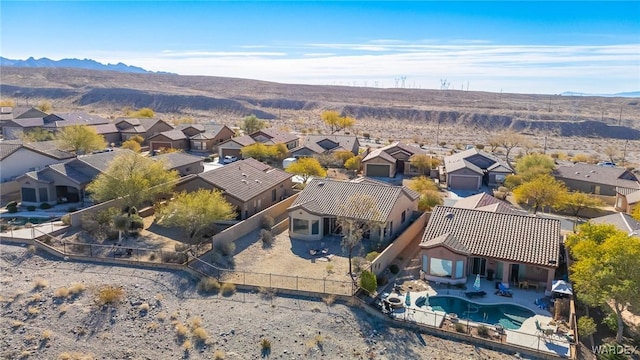 bird's eye view with a residential view and a mountain view