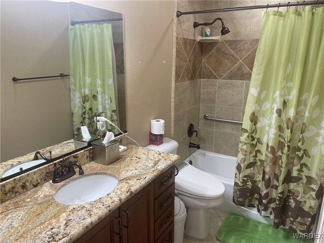 full bath featuring toilet, shower / bathtub combination with curtain, and vanity