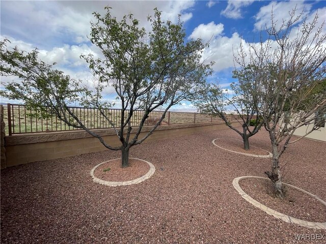 view of yard featuring fence