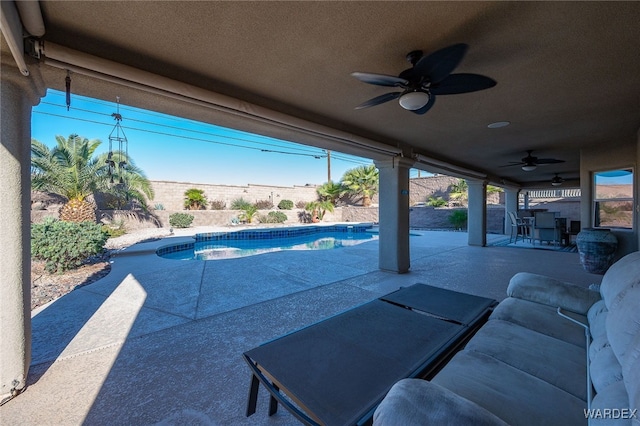 view of patio / terrace featuring ceiling fan, a fenced backyard, and a fenced in pool