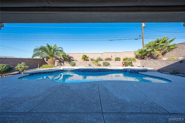 view of pool featuring a fenced backyard